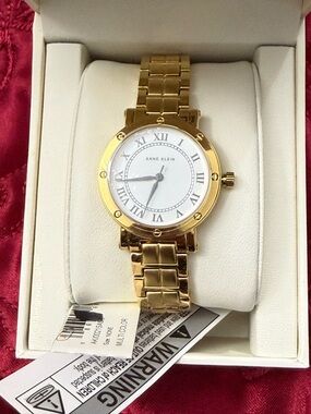 Anne Klein Gold-Tone Roman Numeral Bracelet Watch with box